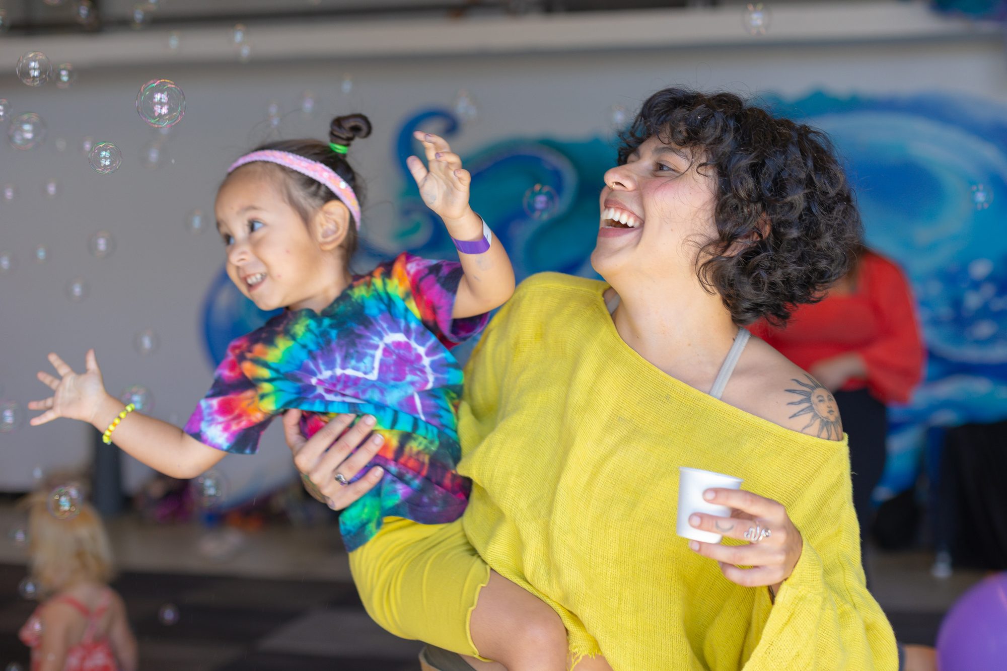 Candid joy at a community event, Austin