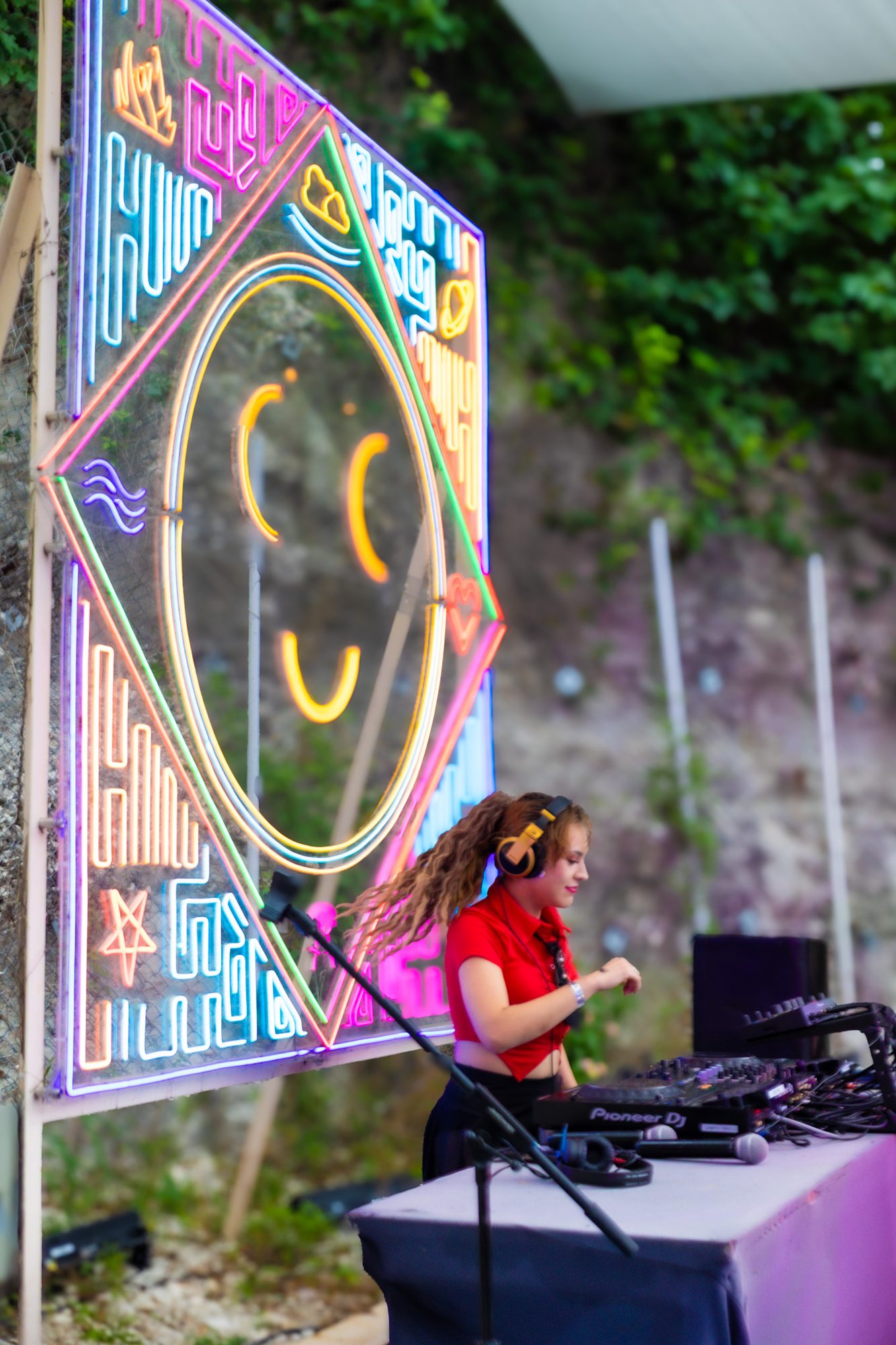 DJ performing at a live event, Austin